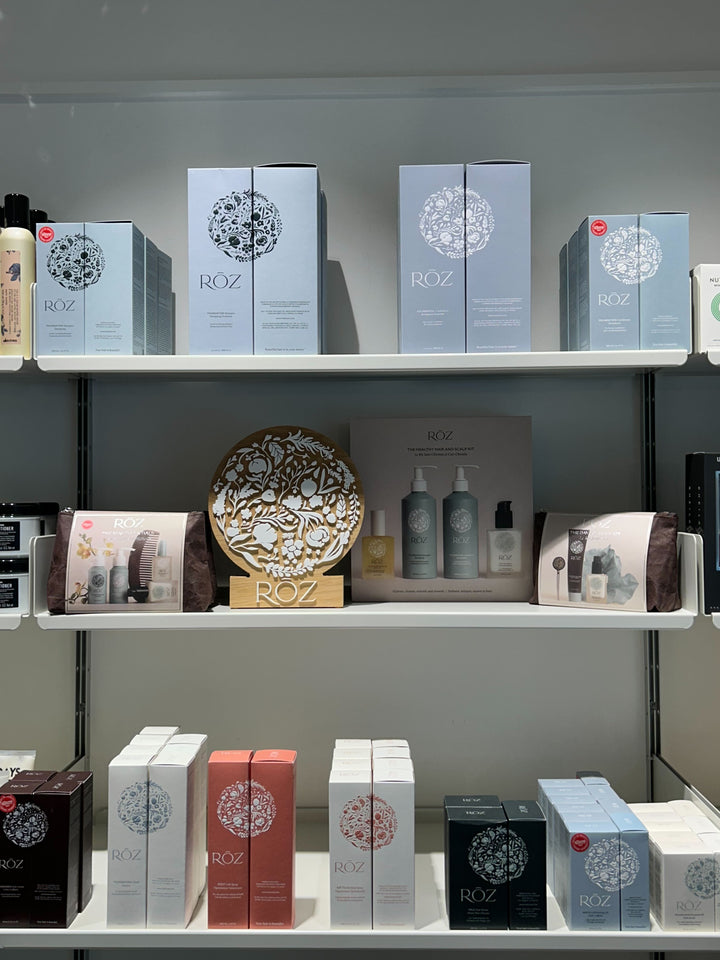 RŌZ haircare products arranged on a salon retail shelf